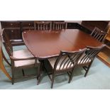 A Stag twin pedestal dining table 73cm high x 215cm wide x 93cm deep with four dining chairs and two