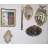 Four gilt wall mirrors and an oval wall mirror (5) Condition Report: Available upon request