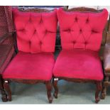 A pair of red upholstered French style chairs (2) Condition Report: Available upon request