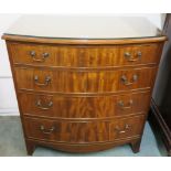 A mahogany bow front chest with four graduating drawers on bracket feet, 88cm high x 84cm wide x