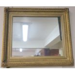 A gilt framed wall mirror, 59cm x 51cm Condition Report: Available upon request