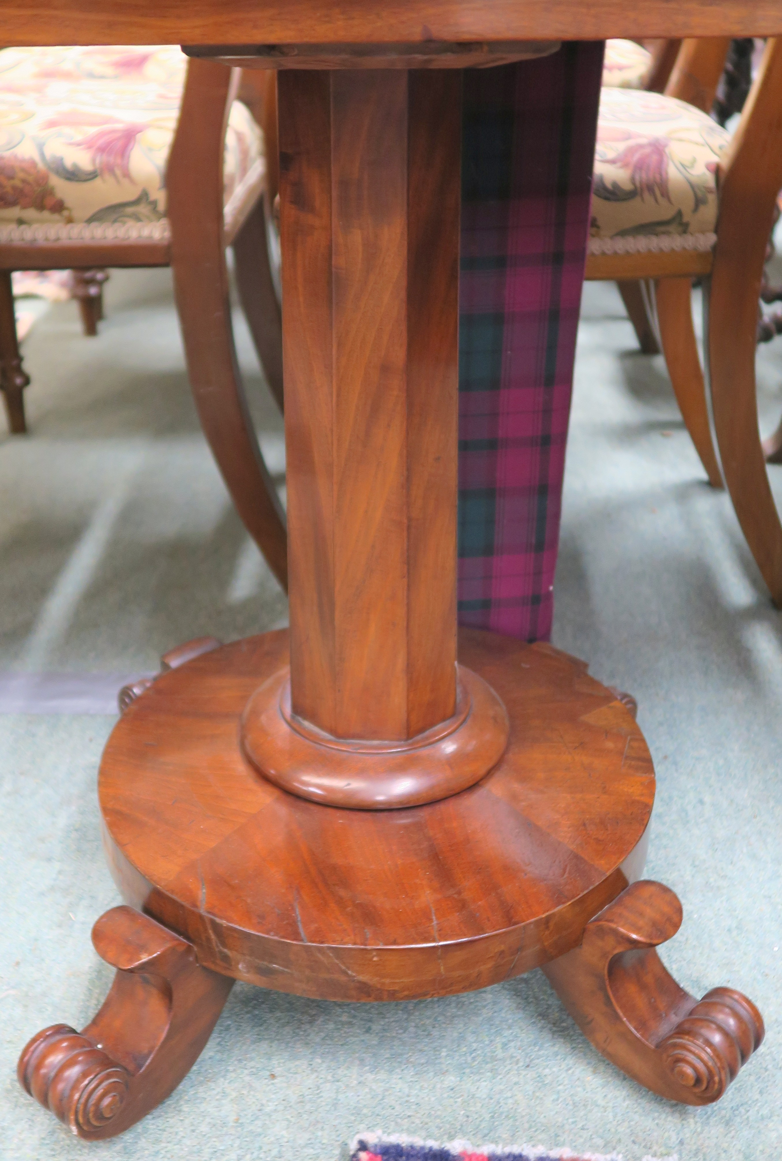 A Victorian mahogany fold over tea table on a pedestal base with four scroll feet, 74cm high x - Image 3 of 3