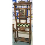 An oak hall stand with mirror and tiled back, 200cm high x 74cm wide x 29cm deep Condition Report: