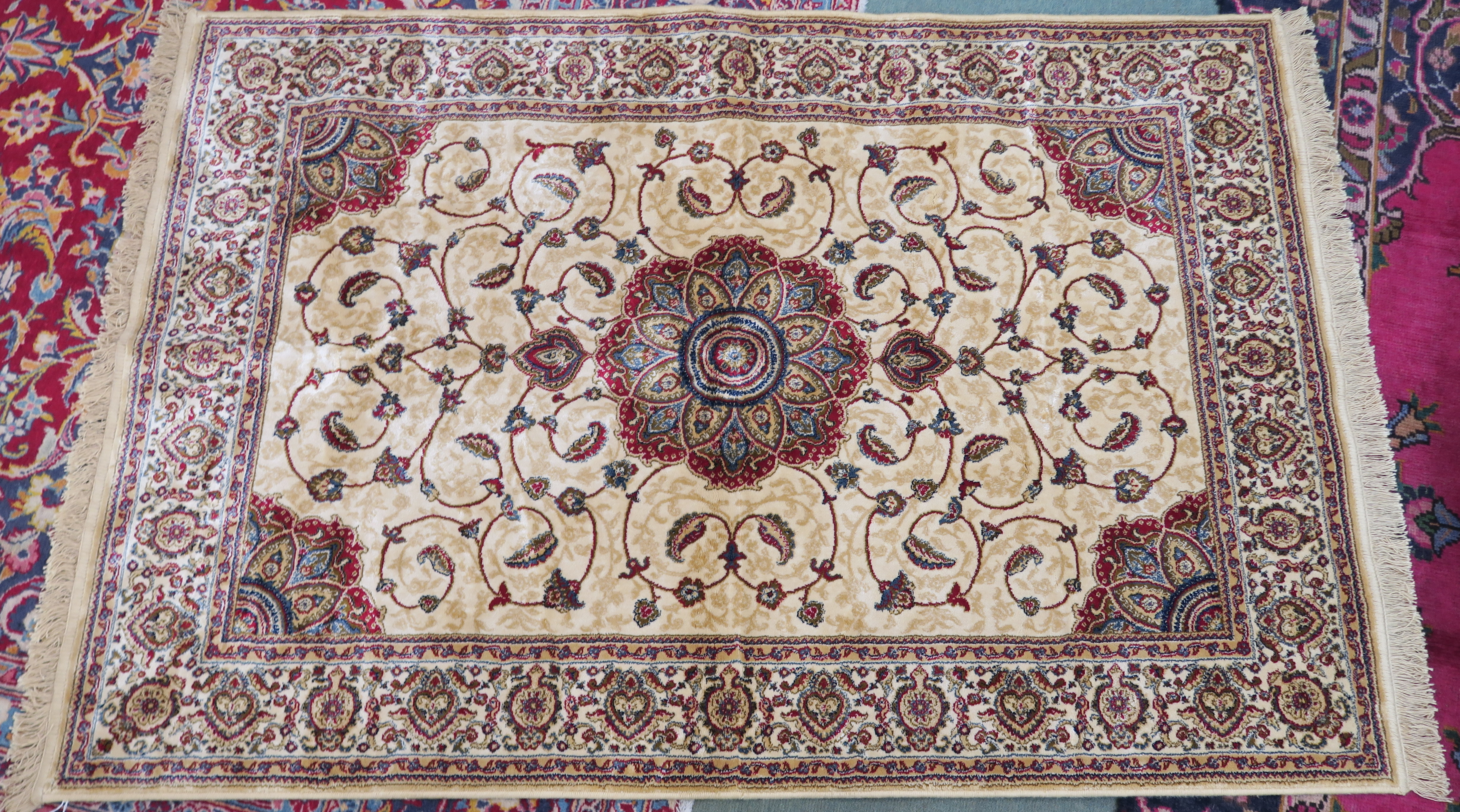 A modern ivory ground Kashmir rug with unique floral design, 170cm x 116cm Condition Report: