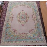 A wool floral rug, 270cm x 185cm Condition Report: Available upon request
