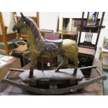 A small wooden rocking horse, 85cm high Condition Report:
