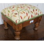 A small upholstered footstool, 22cm high x 28cm wide x 22cm deep Condition Report: Available upon