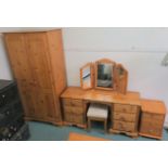 A pine bedroom suite comprising, double wardrobe, 189cm high x 90cm wide x 54cm deep, dressing