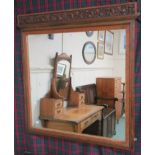 A carved oak wall mirror, 98cm high x 94cm wide Condition Report: Available upon request