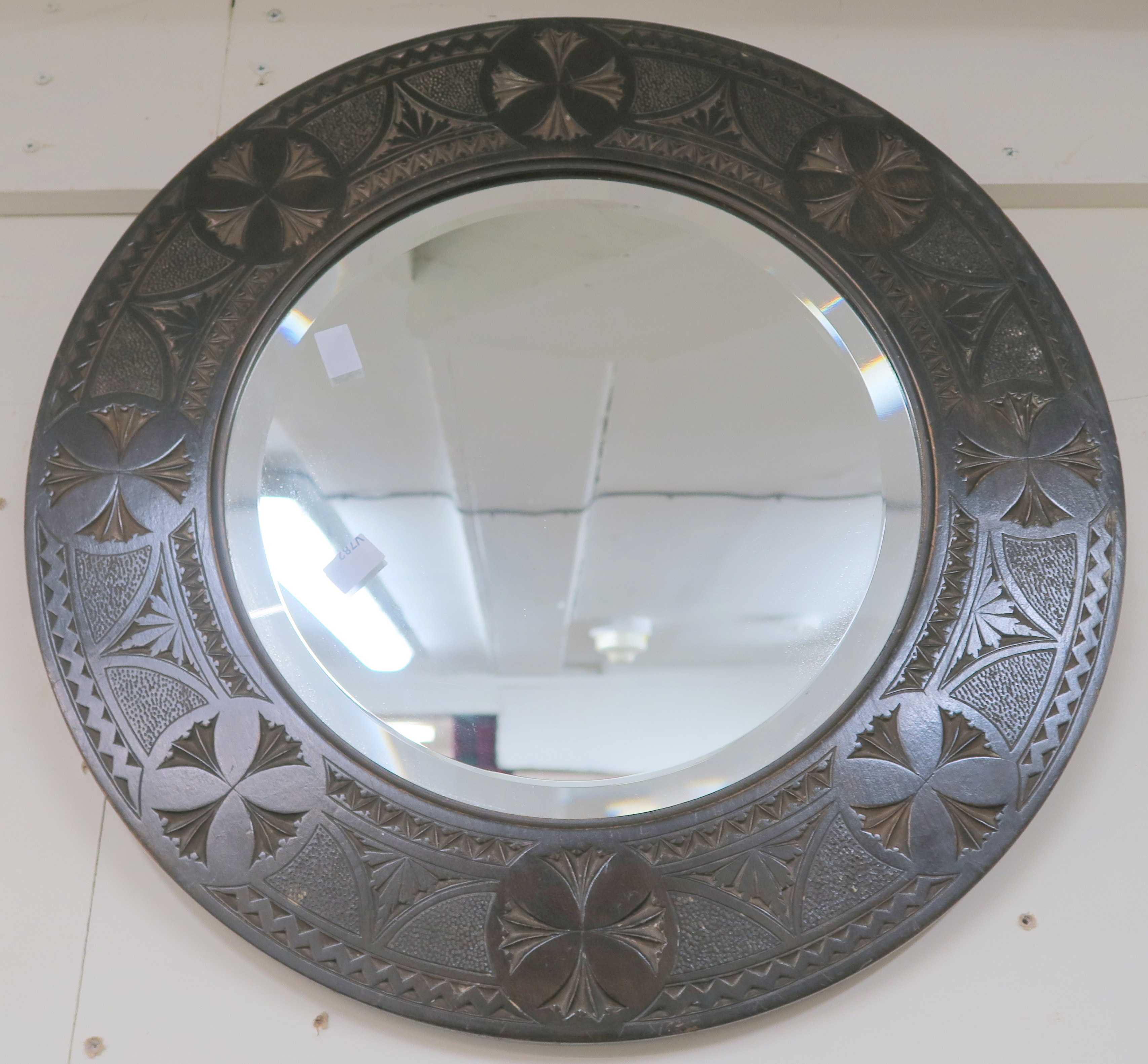 A carved oak circular wall mirror 46cm diameter and an oval wall mirror (2) Condition Report: - Image 3 of 3