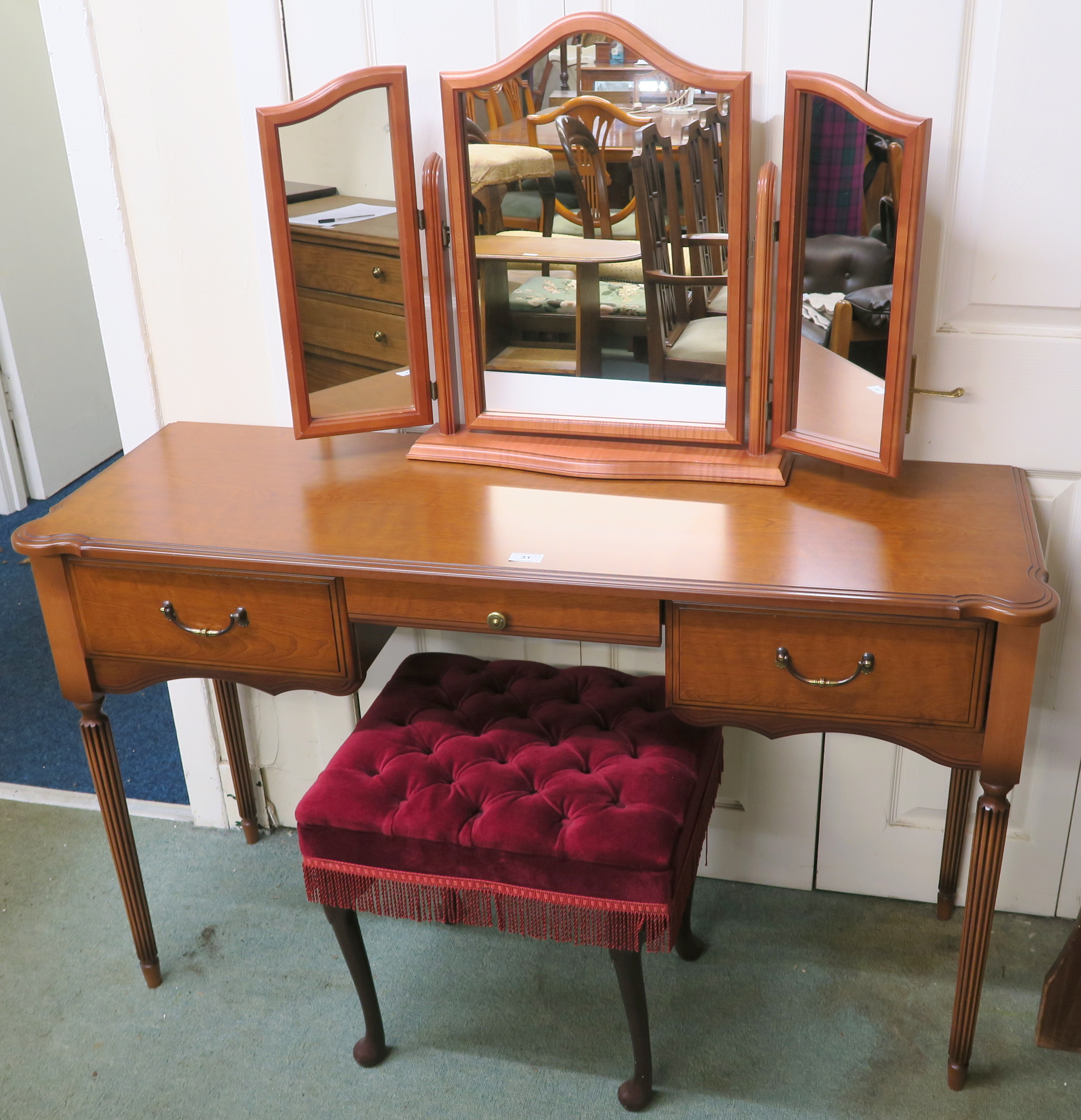 A reproduction dressing table, 76cm high x 126cm wide x 43cm deep. dressing stool and a pine