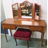A reproduction dressing table, 76cm high x 126cm wide x 43cm deep. dressing stool and a pine