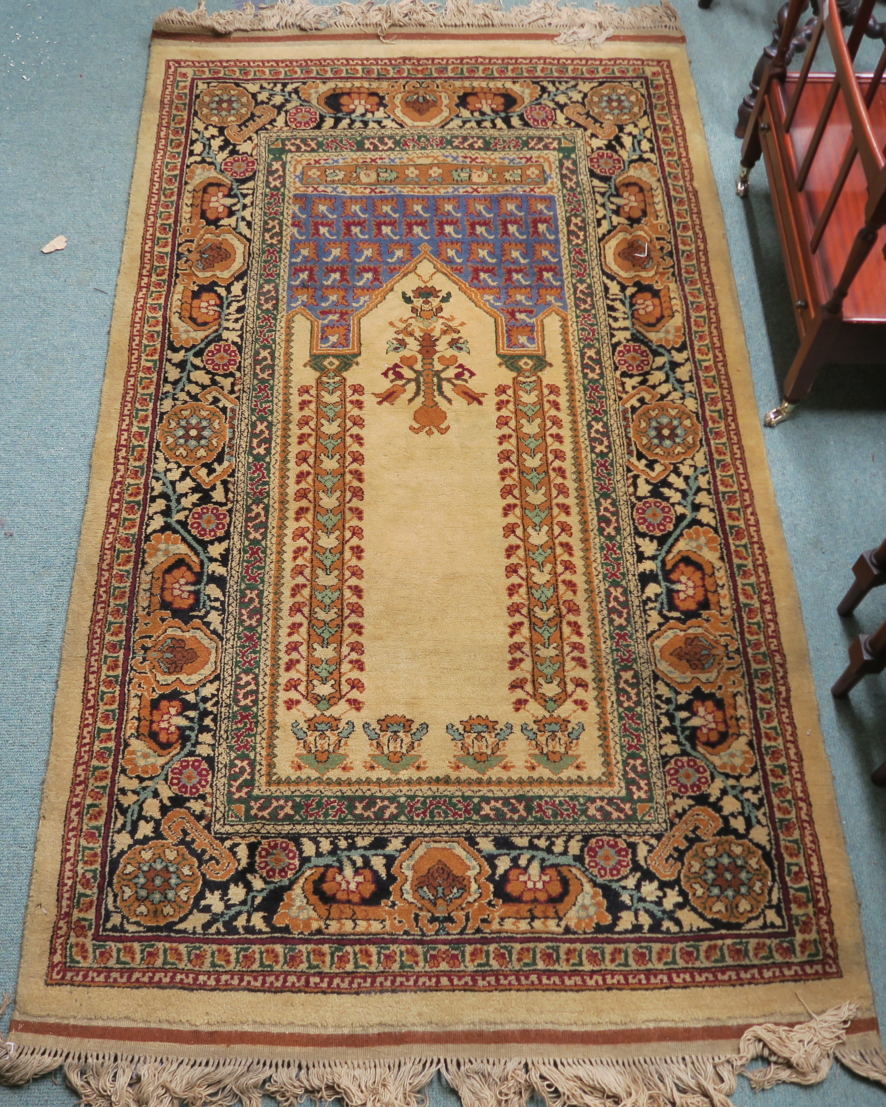 An Eastern prayer rug, 170cm x 98cm Provenance: The Late Dr Helen. E. C. Cargill Thompson