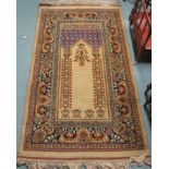 An Eastern prayer rug, 170cm x 98cm Provenance: The Late Dr Helen. E. C. Cargill Thompson