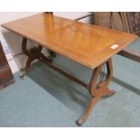 A reproduction mahogany occasional table, 46cm high x 82cm wide x 39cm deep Condition Report: