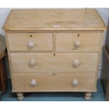 A pine two over two chest of drawers, 83cm high x 85cm wide x 46cm deep Condition Report: