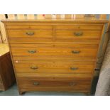 An oak two over three chest of drawers by Wylie and Lochhead, 122cm high x 123cm wide x 53cm deep