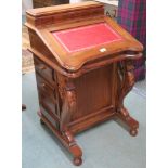 A reproduction Davenport with red leather skiver, 85cm high x 55cm wide x 55cm deep Condition