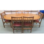 A Mid Century G Plan teak oval extending dining table with two carvers and four chairs (7) Condition