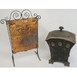 A wrought iron and copper finish Arts and Crafts firescreen, 77cm high x 52cm wide and an Arts and