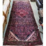 A rich blue ground full pile Persian Soroka runner with central medallion, 300cm x 117cm Condition