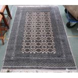 A light ground Eastern style rug, 187cm x 130cm Condition Report: Available upon request
