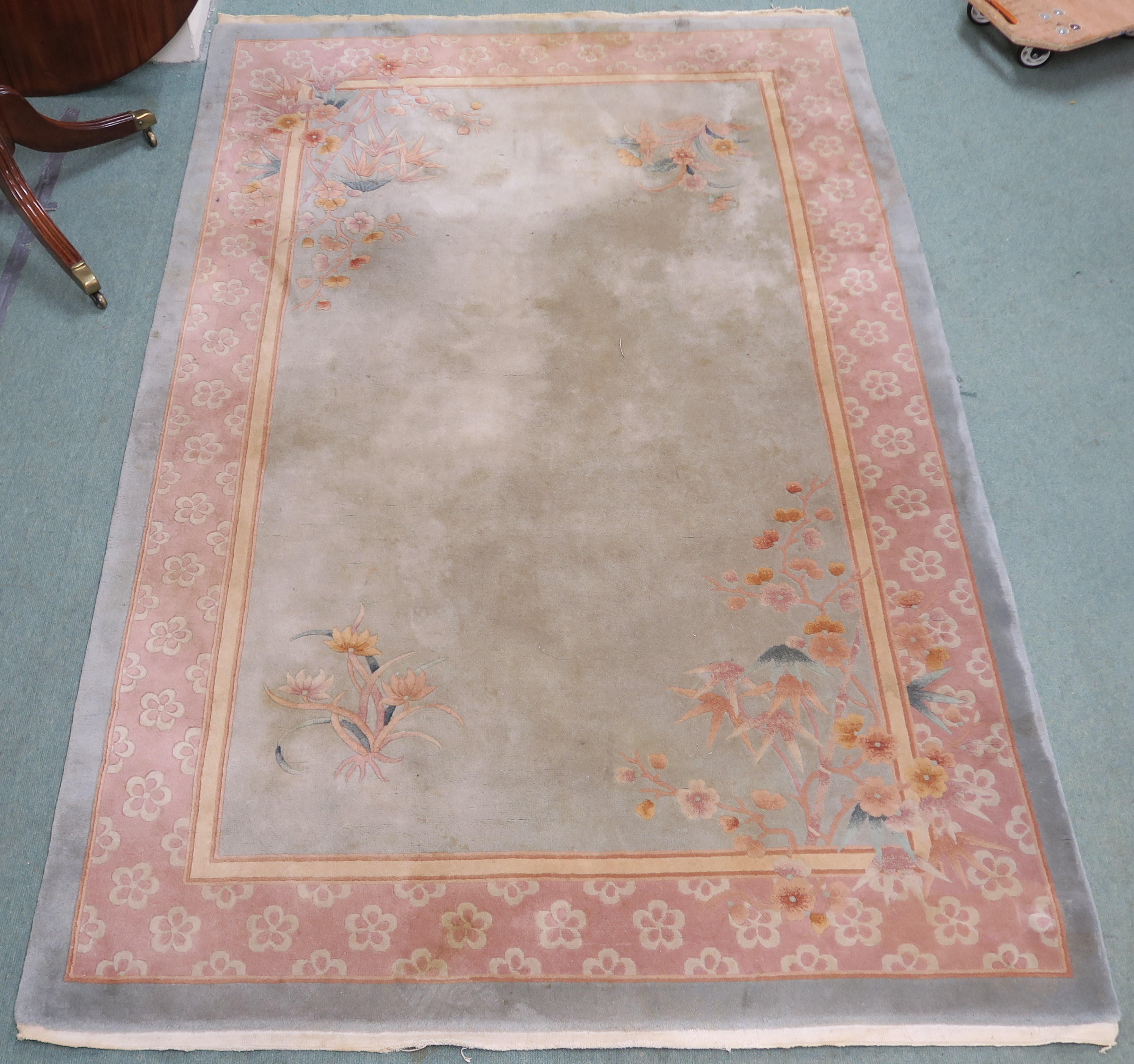 A light green ground wool rug, 280cm x 184cm Condition Report: Available upon request