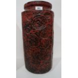 A large West German pottery vase, decorated with concentric circles under a rough red and black