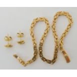 A 9ct gold Italian made chain bracelet, length 20cm, together with a pair of knot shaped earrings,