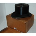 A black top hat by Carswell, Glasgow, 8 x 6.5" Condition Report: Available upon request