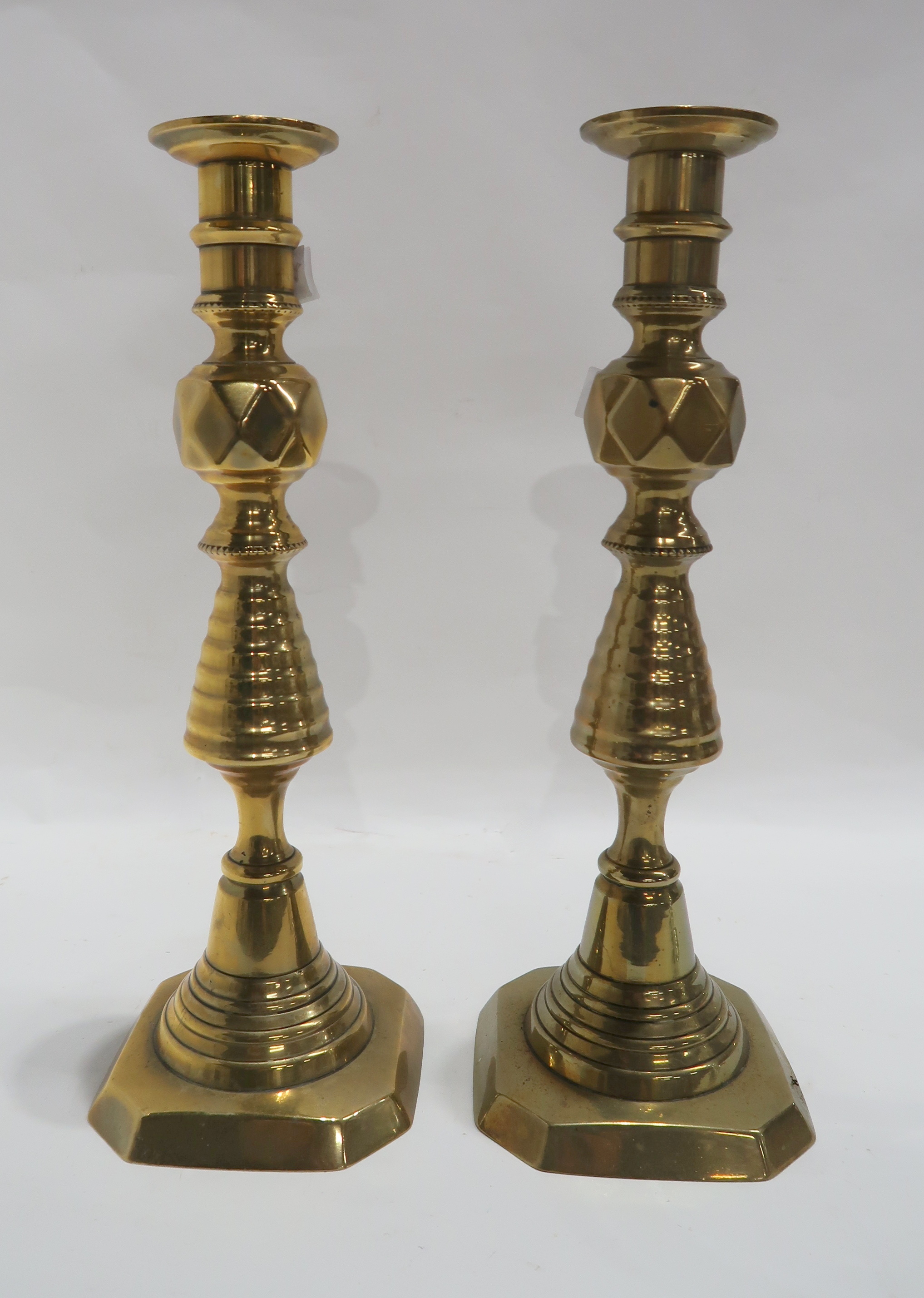 A pair of brass candlesticks and a pair of glass goblet produced for the Design Centre to - Image 2 of 5