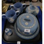 A Wedgwood blue jasper cheese bell and stand, a teapot, a bell and two boxed Harrow School loving