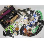 A collection of vintage costume jewellery to include a carved amber bracelet (af), Ciro faux