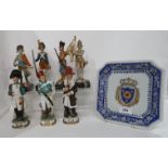 A decorative Versailles plate, together with assorted ceramic and composite military figures