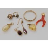 A 9ct three colour gold wedding ring size T1/2, a citrine heart pendant, a coral pendant and other