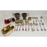 A box of EP and silver - christening mugs, napkin rings and two pairs of opera glasses Condition