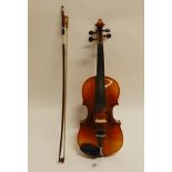 A Skylark violin 31cm with a bow 56cm, 46gms and Skylark violin case Condition Report: Available