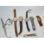 A collection of gents and ladies wrist watches Condition Report: Available upon request