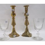 A pair of brass candlesticks and a pair of glass goblet produced for the Design Centre to