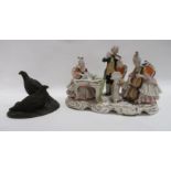 A bronzed group of grouse together with a German porcelain group of musicians, 21cm long Condition