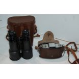 A Zeiss Ikon camera, vintage binoculars, projectors etc Condition Report: Available upon request