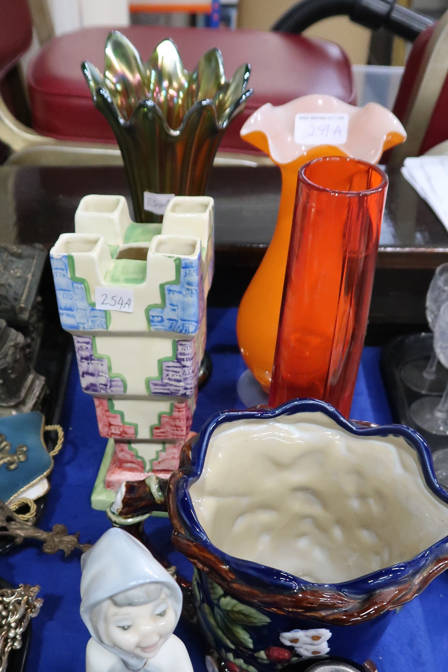 A Myott and Son brick vase, a carnival glass vase and other items Condition Report: Not available