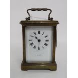 A French glass and brass carriage clock, retailed by Drew and Co, 156 & 157 Leadenhall St, 11cm high