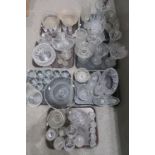 A large collection of cut glass, crystal and other glassware including bowls, vases, dishes etc