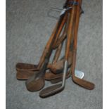 Thirteen various hickory-shafted golf clubs including one wood Condition Report: Available upon