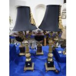 A pair of large gilt metal table lamps in the form of candelabras Condition Report: Available upon