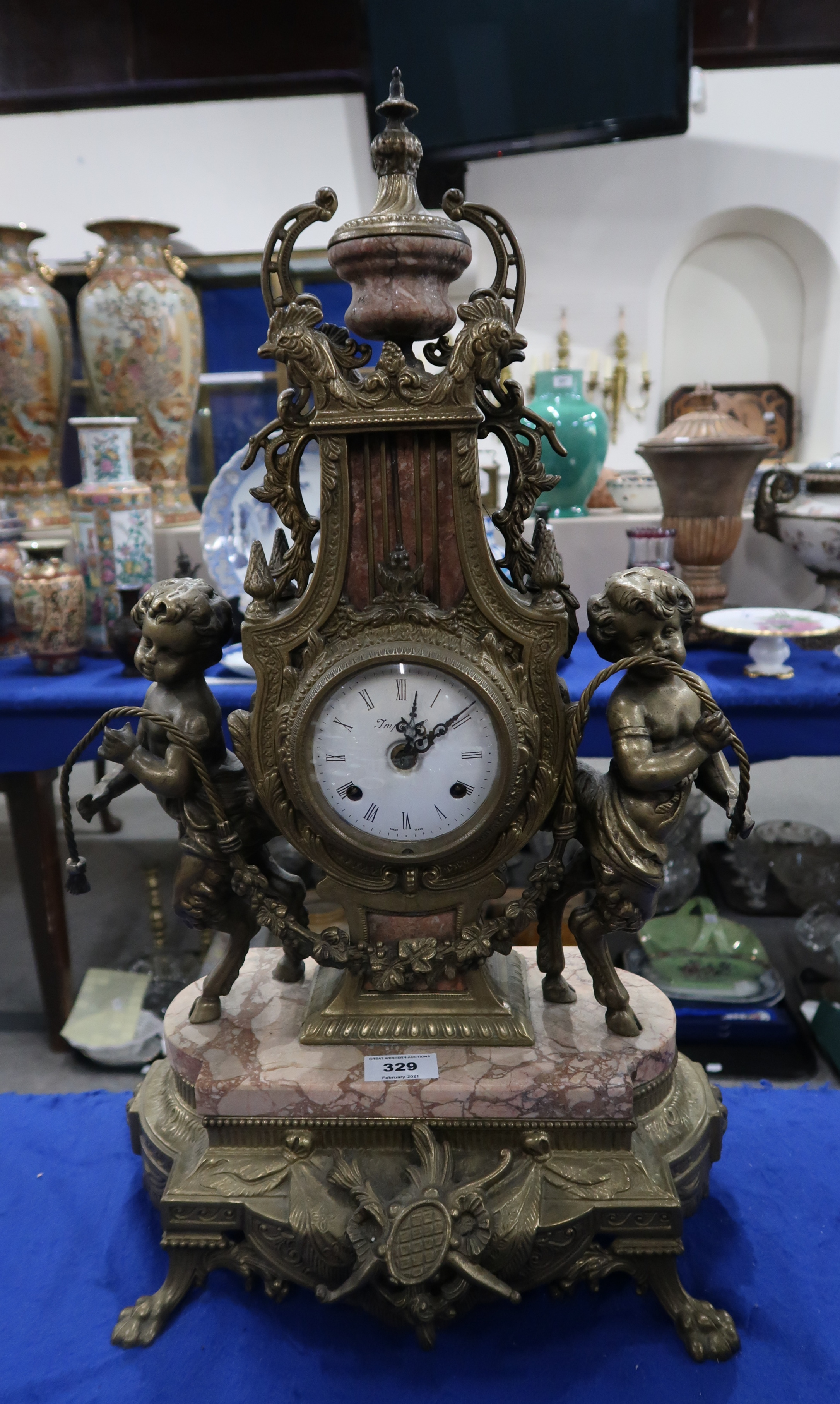 An Italian Imperial clock garniture, the dial with Roman numerals flanked either side by fauns, upon - Image 2 of 3