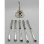 A lot comprising a silver wine funnel (def) unclear marks and five silver handled knives Condition