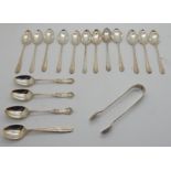 A lot comprising a set of twelve silver coffee spoons with tongs (loose), Glasgow 1891 with four