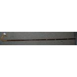A large shepherd's crook, 153cm long Condition Report: Available upon request